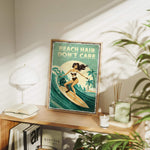 a framed poster of a woman surfing on a wave, with the text "BEACH HAIR DON'T CARE" written on it. The poster is displayed on a shelf, surrounded by various items such as books, plants, and a lamp.