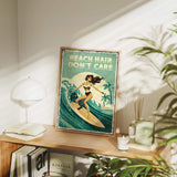 a framed poster of a woman surfing on a wave, with the text "BEACH HAIR DON'T CARE" written on it. The poster is displayed on a shelf, surrounded by various items such as books, plants, and a lamp.