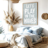 a bedroom with a large bed and a poster on the wall