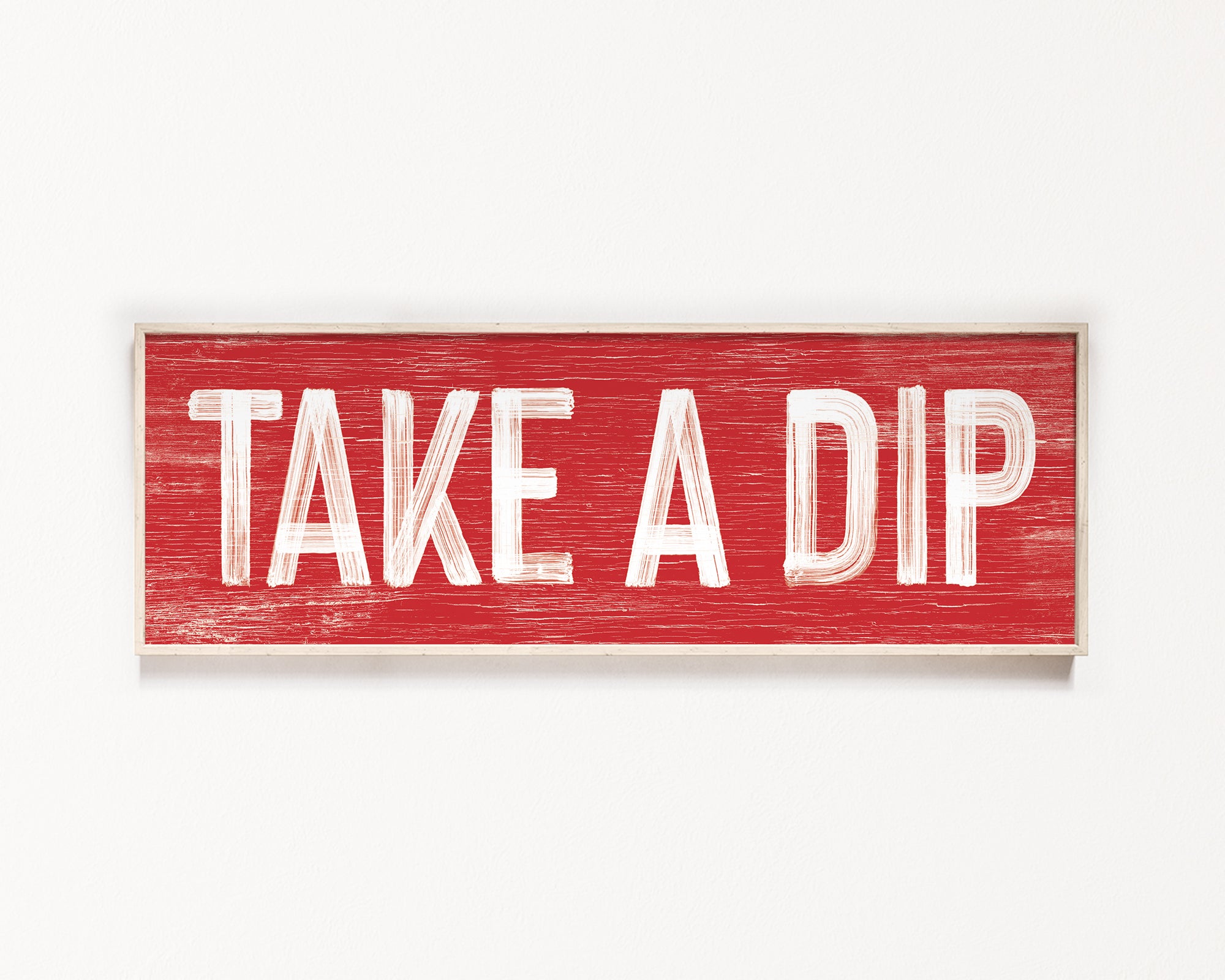 a red sign that says take a dip