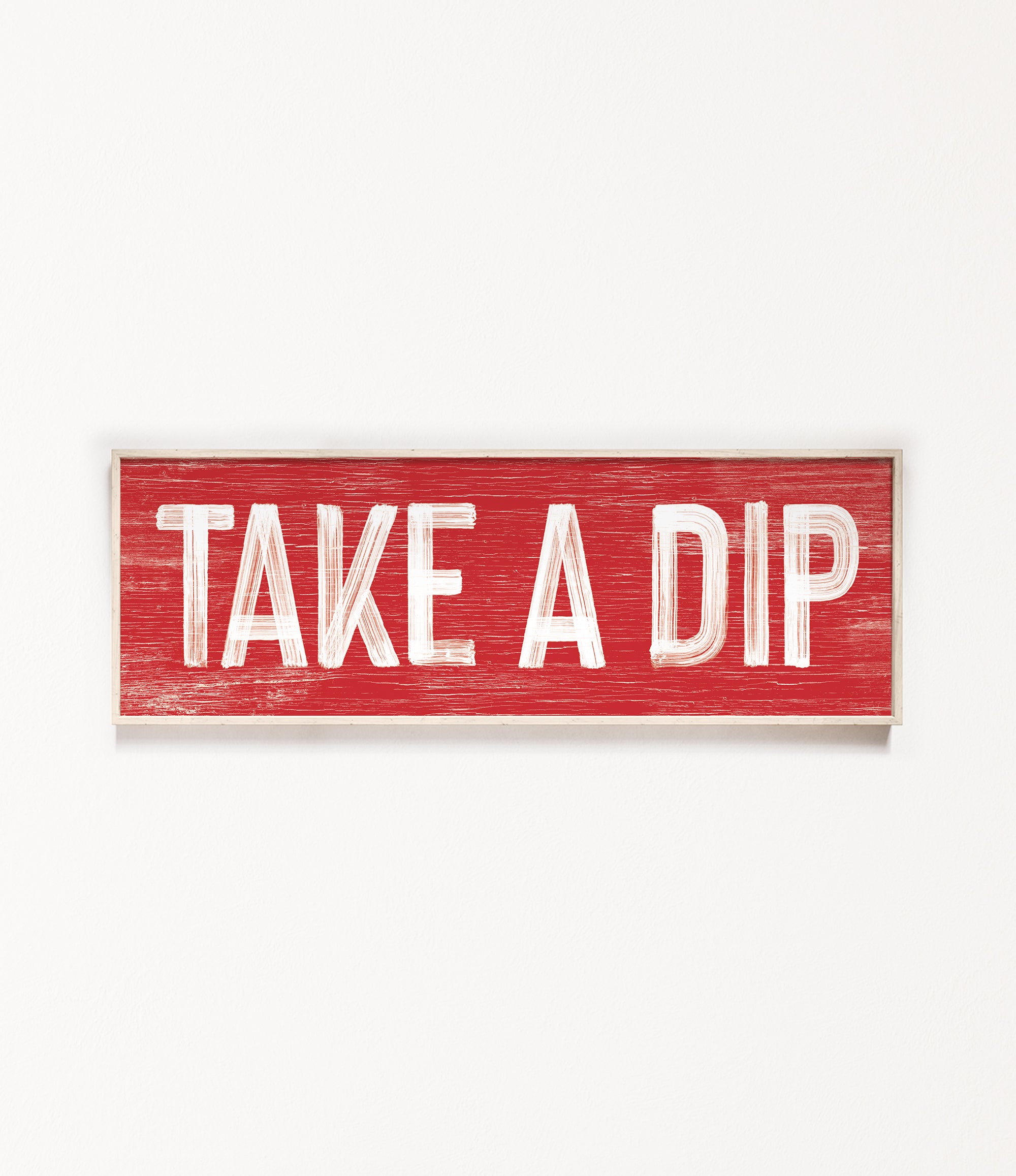 a red sign that says take a dip