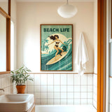 a bathroom with a framed poster of a woman surfing on the wall, a potted plant, a sink, and a towel.