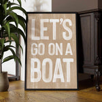a wooden sign that says let&#39;s go on a boat