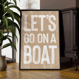 a wooden sign that says let&#39;s go on a boat