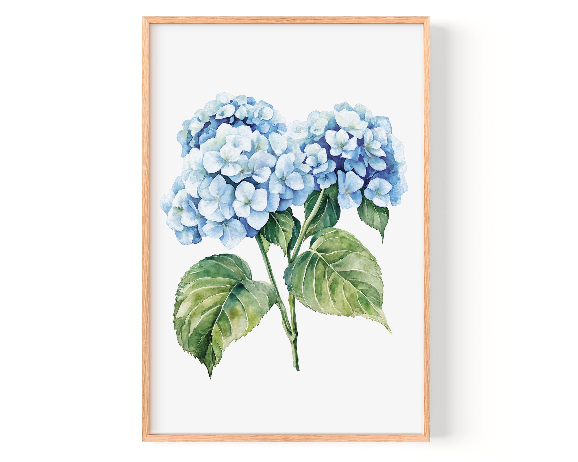 A framed watercolor painting depicting a cluster of blue hydrangea flowers with green leaves.