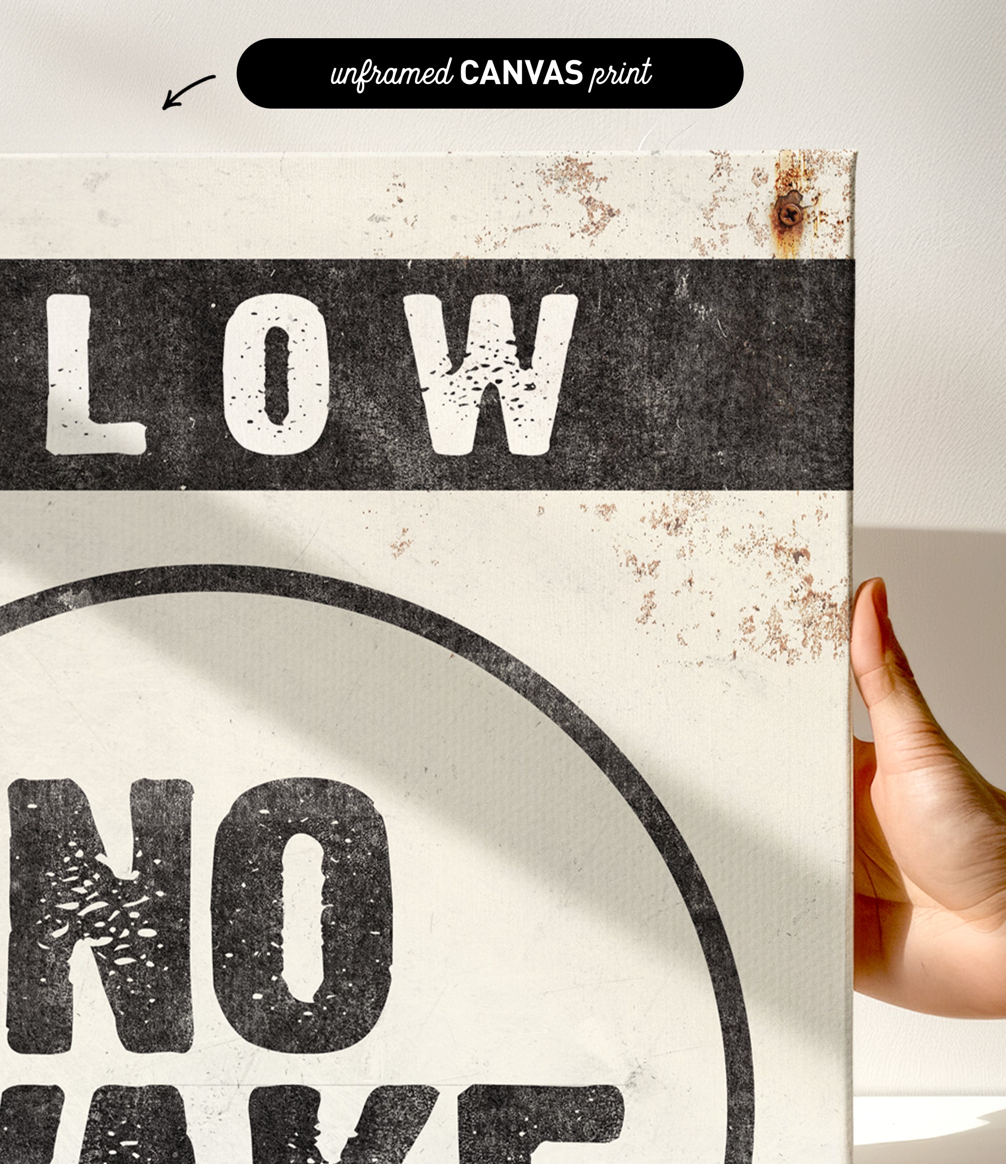 a hand holding a sign that says slow no wave