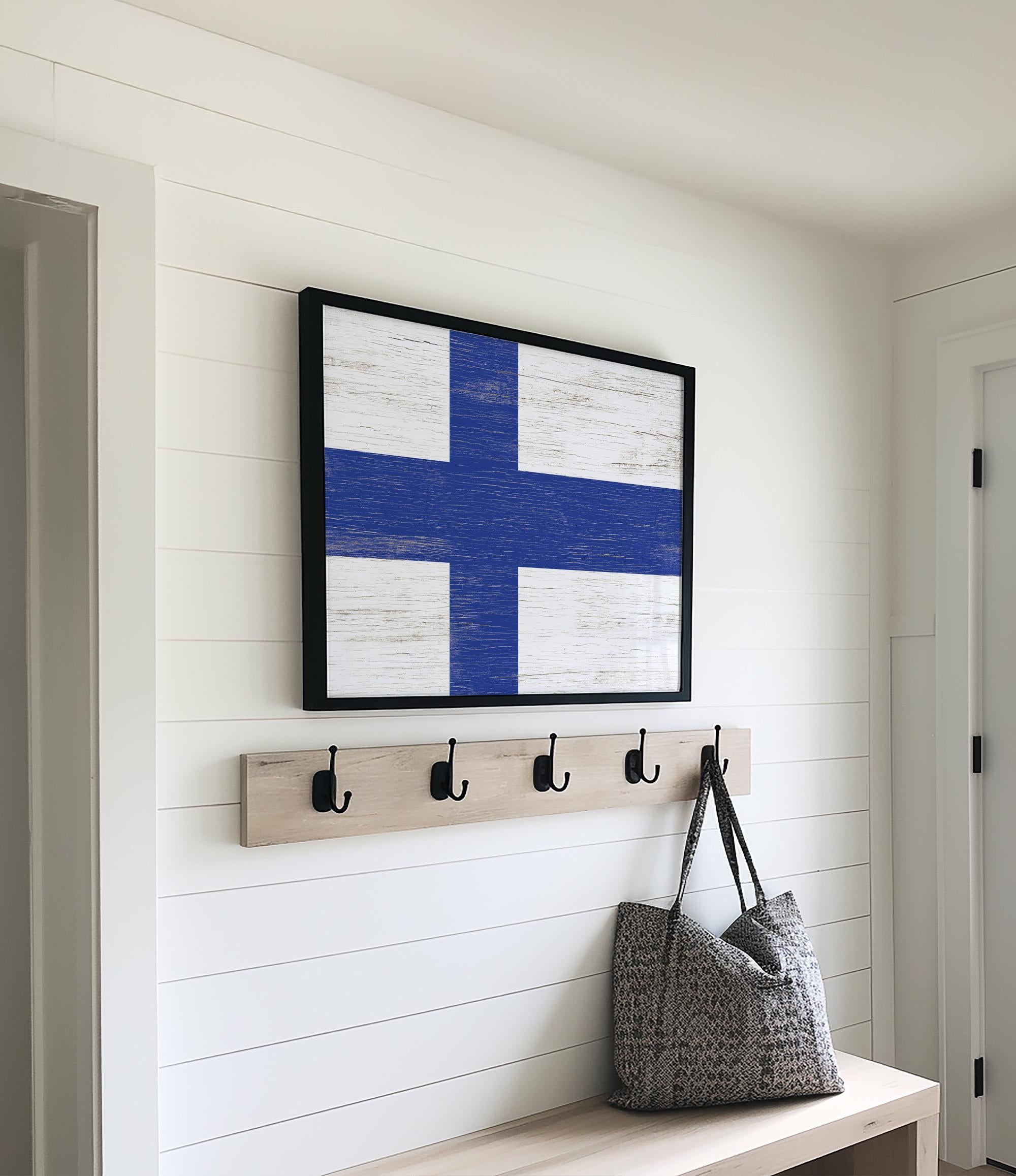 a wooden bench with a coat rack and a bag on it