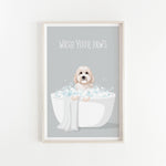 A framed illustration of a dog sitting in a bathtub filled with bubbles, with the text "WASH YOUR PAWS" displayed above it.