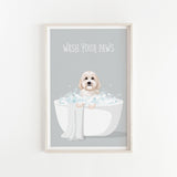 A framed illustration of a dog sitting in a bathtub filled with bubbles, with the text "WASH YOUR PAWS" displayed above it.