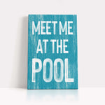 a blue sign that says meet me at the pool