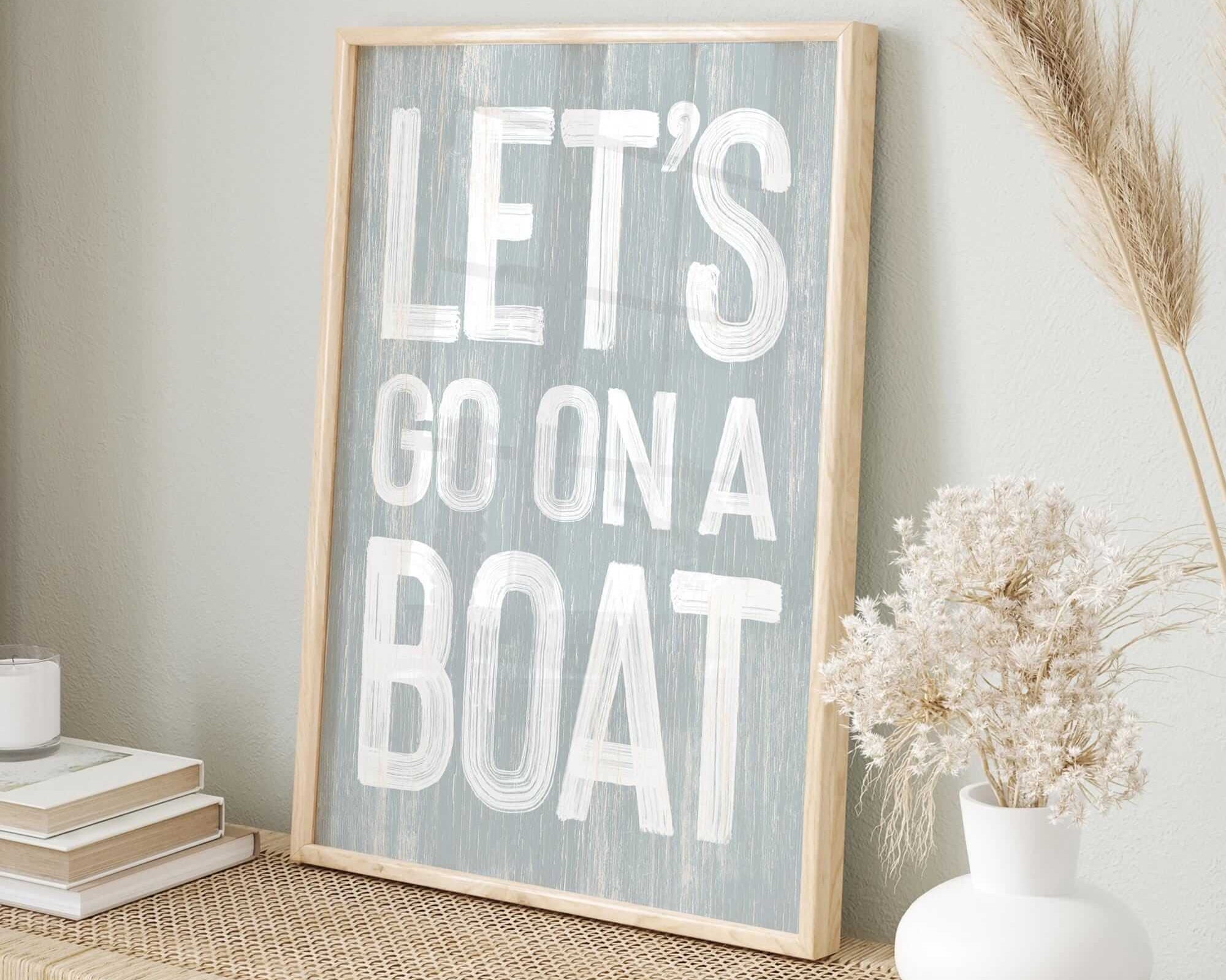 a sign that says let's go on a boat on a shelf