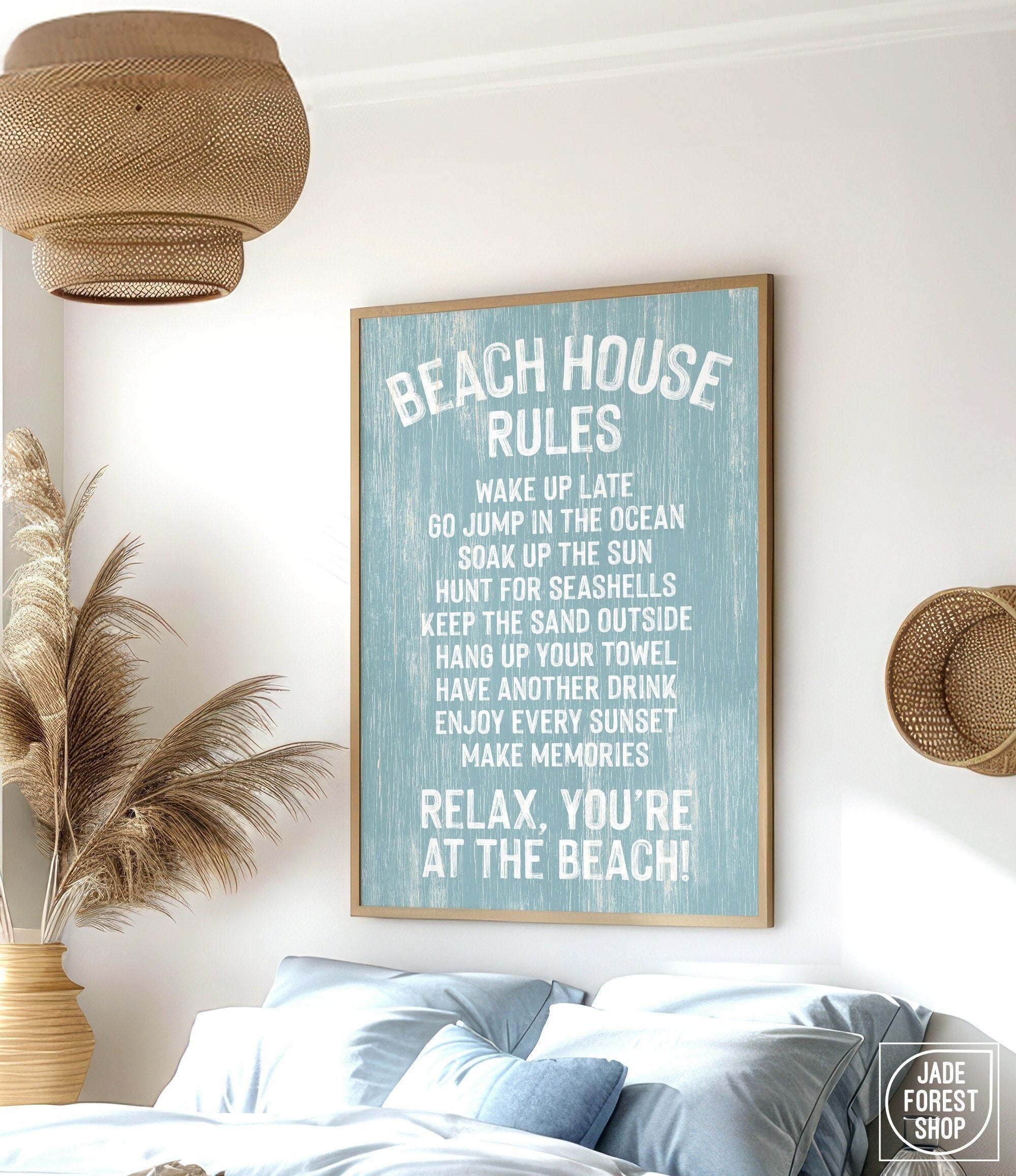 The Beach House Rules Sign, Painted Wood, Tide, hangs on the wall of a coastal-themed bedroom, adding charming beach house decor with its relaxed guidelines.