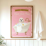 A framed poster with a dog sitting in a bathtub, surrounded by bubbles, and a sign that says "Please don't forget to wash your pans".