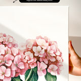 a close-up of a painting of pink hydrangea flowers on a white background.