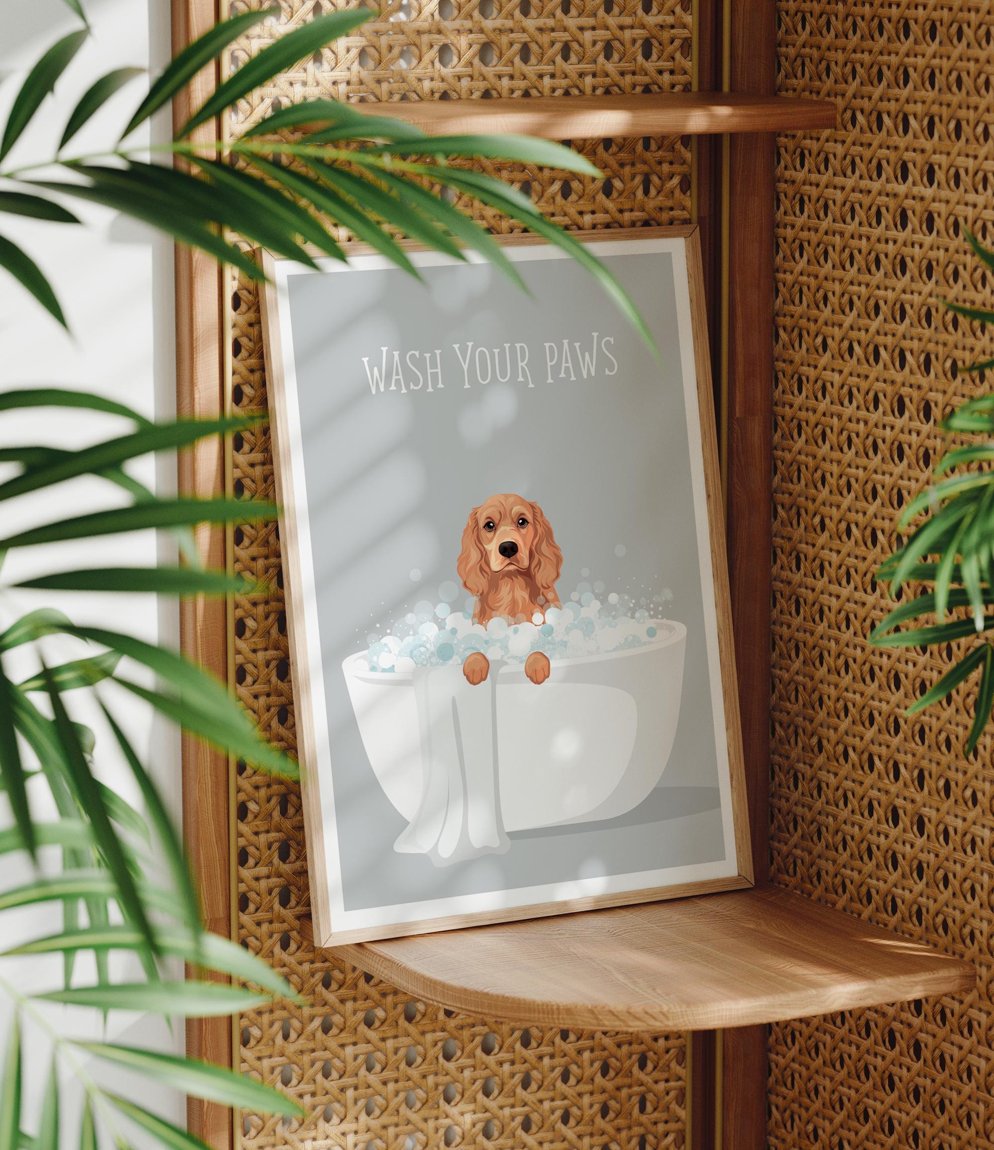 A framed poster with a dog sitting in a bathtub, surrounded by plants, with the text "WASH YOUR PAWS" displayed prominently.
