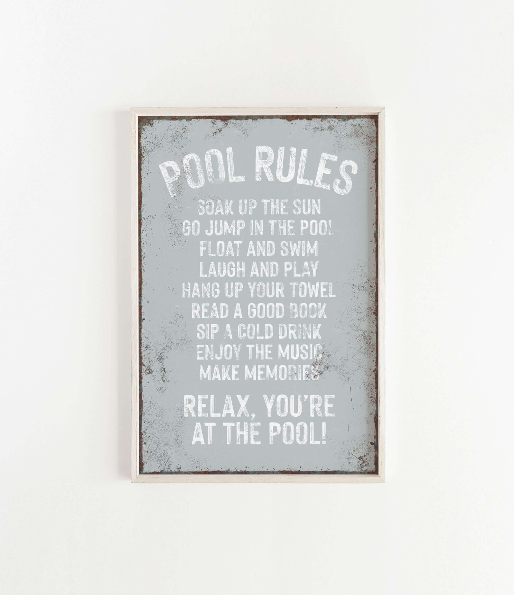 a sign that says pool rules hanging on a wall