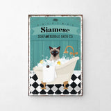 A vintage-style poster advertising Siamese Soap and Bubble Bath Co., featuring a Siamese cat sitting in a bathtub filled with bubbles.