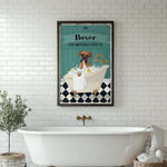 A framed vintage advertisement for "Boxer Soap and Bubble Bath Co." featuring a dog sitting in a bathtub filled with bubbles.