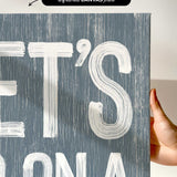 a person holding up a sign that says it&#39;s bona