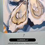 The image is an aluminum print featuring a close-up view of several oyster shells, with a text overlay indicating that it is a waterproof print suitable for outdoor use and includes hanging hardware.