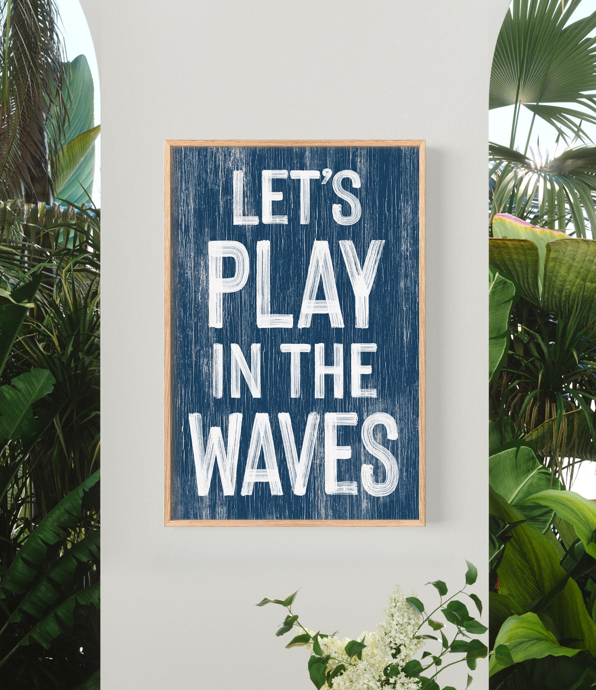 a blue sign that says let&#39;s play in the waves