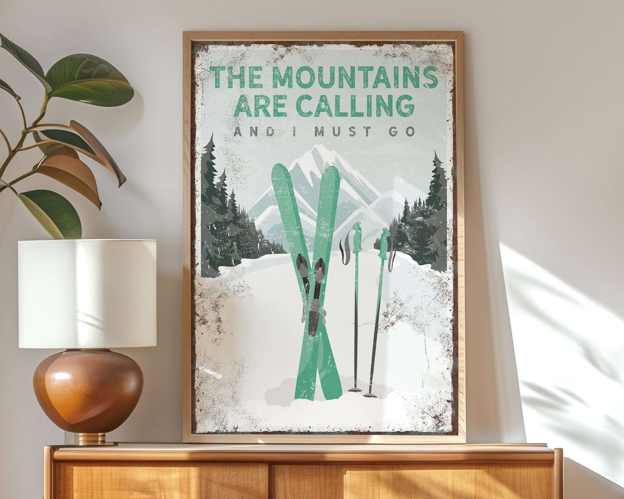 a poster of a pair of skis on top of a dresser