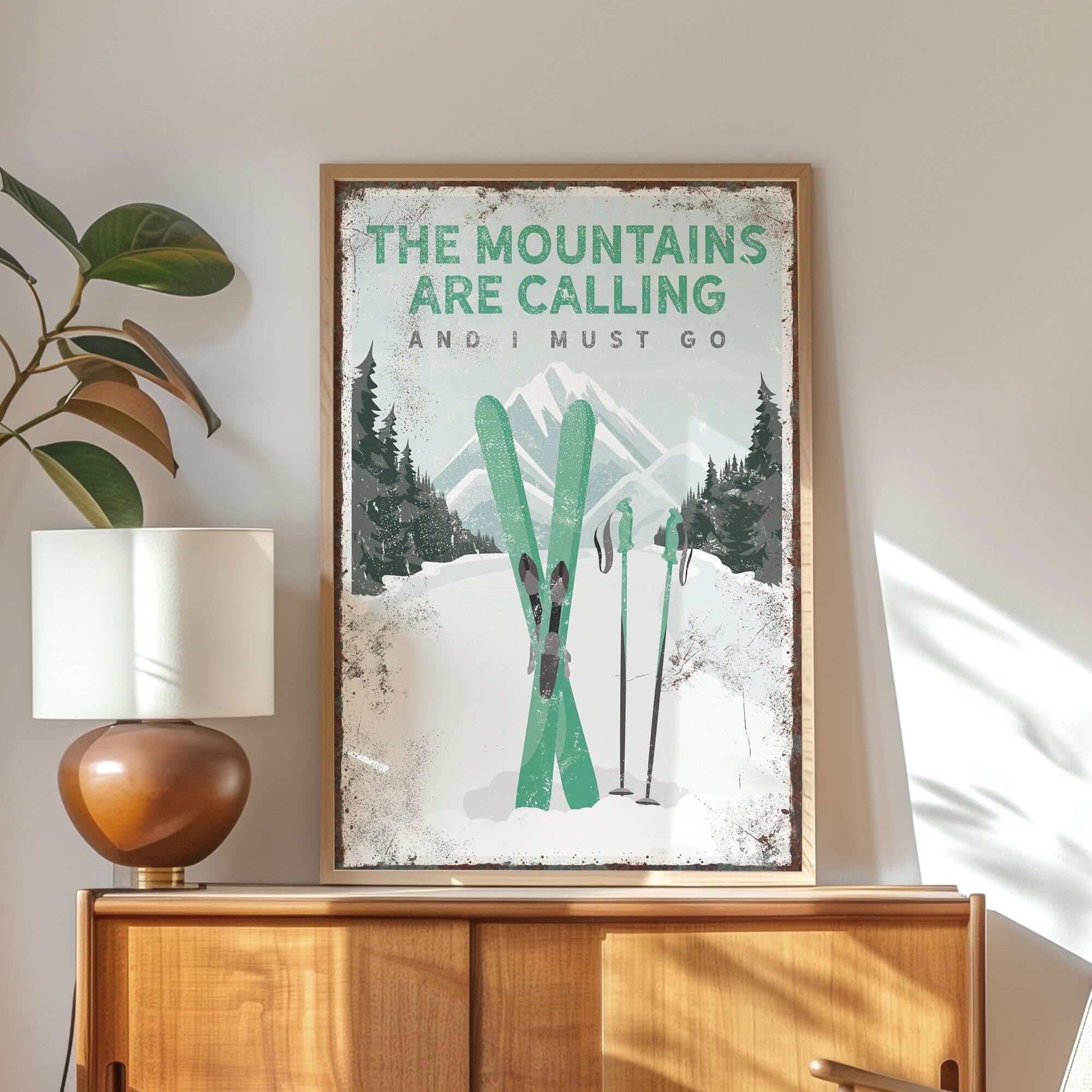 a poster of a pair of skis on top of a dresser