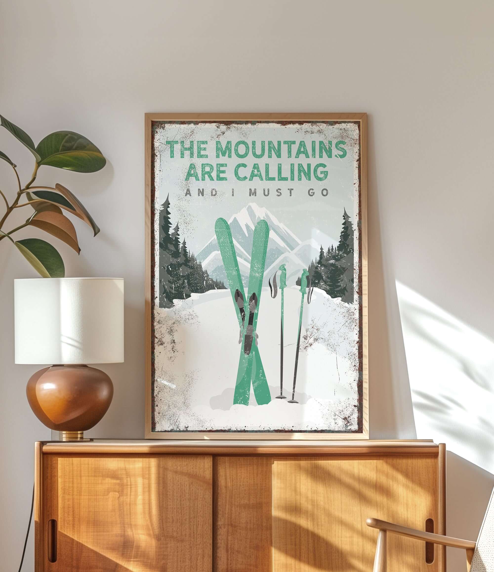 a poster of a pair of skis on top of a dresser