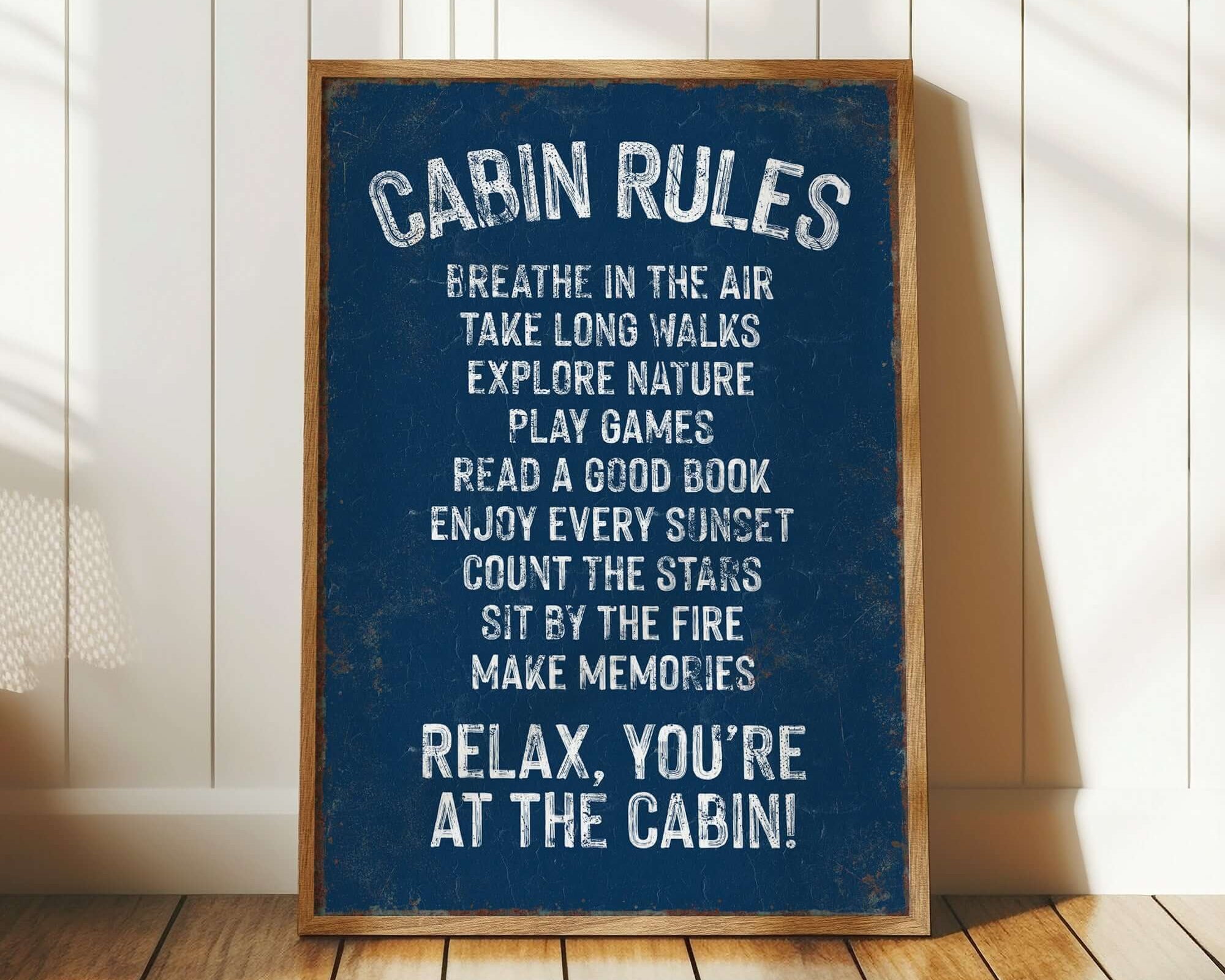 a blue sign that says cabin rules on it