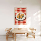 a dining room with a wooden table and four chairs, all facing a large painting of a plate of pears hanging on the wall above the table.