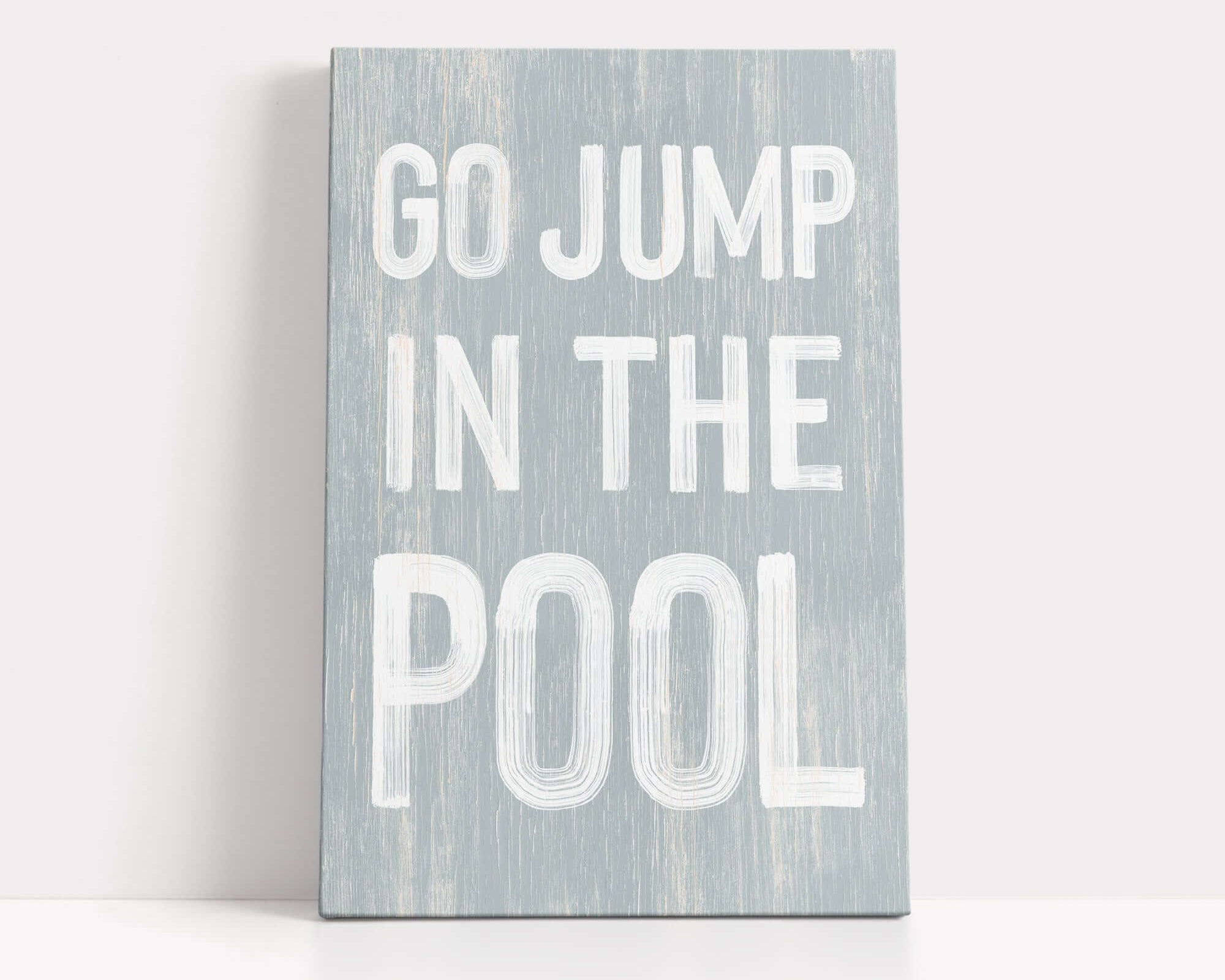 a sign that says go jump in the pool