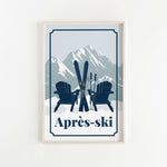 A framed print featuring a pair of blue Adirondack chairs with skis and poles, set against a snowy mountain backdrop.