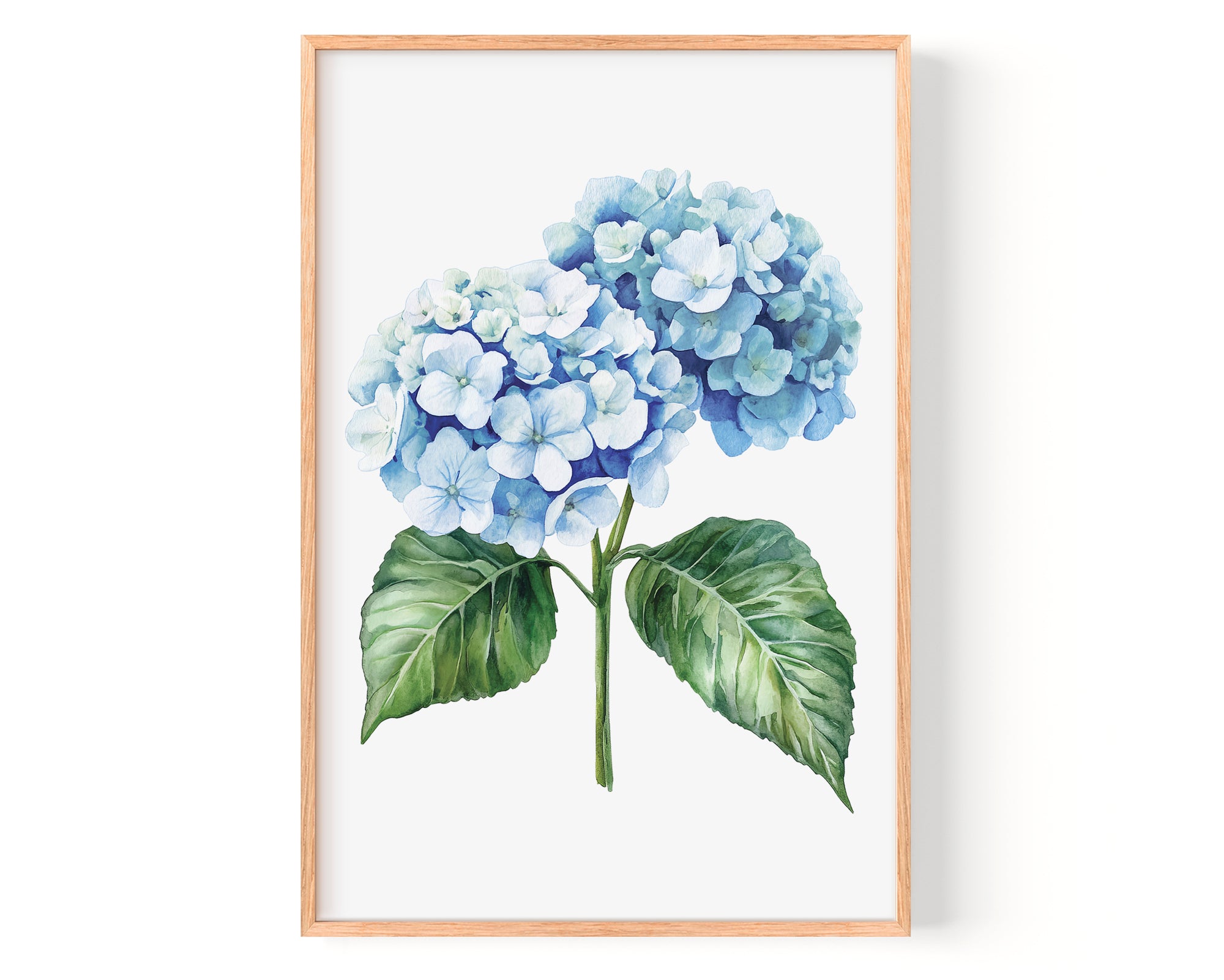 A framed watercolor painting depicting a cluster of blue hydrangea flowers with green leaves.