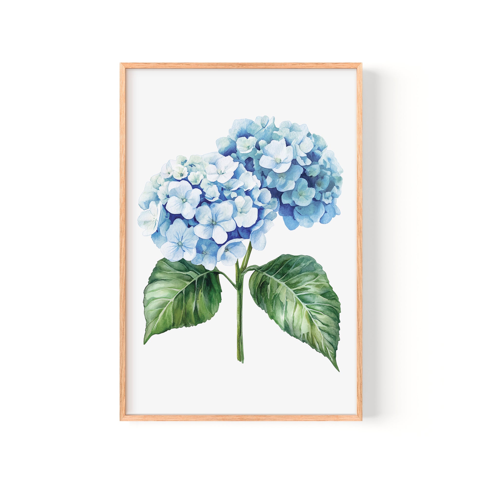 A framed watercolor painting depicting a cluster of blue hydrangea flowers with green leaves.