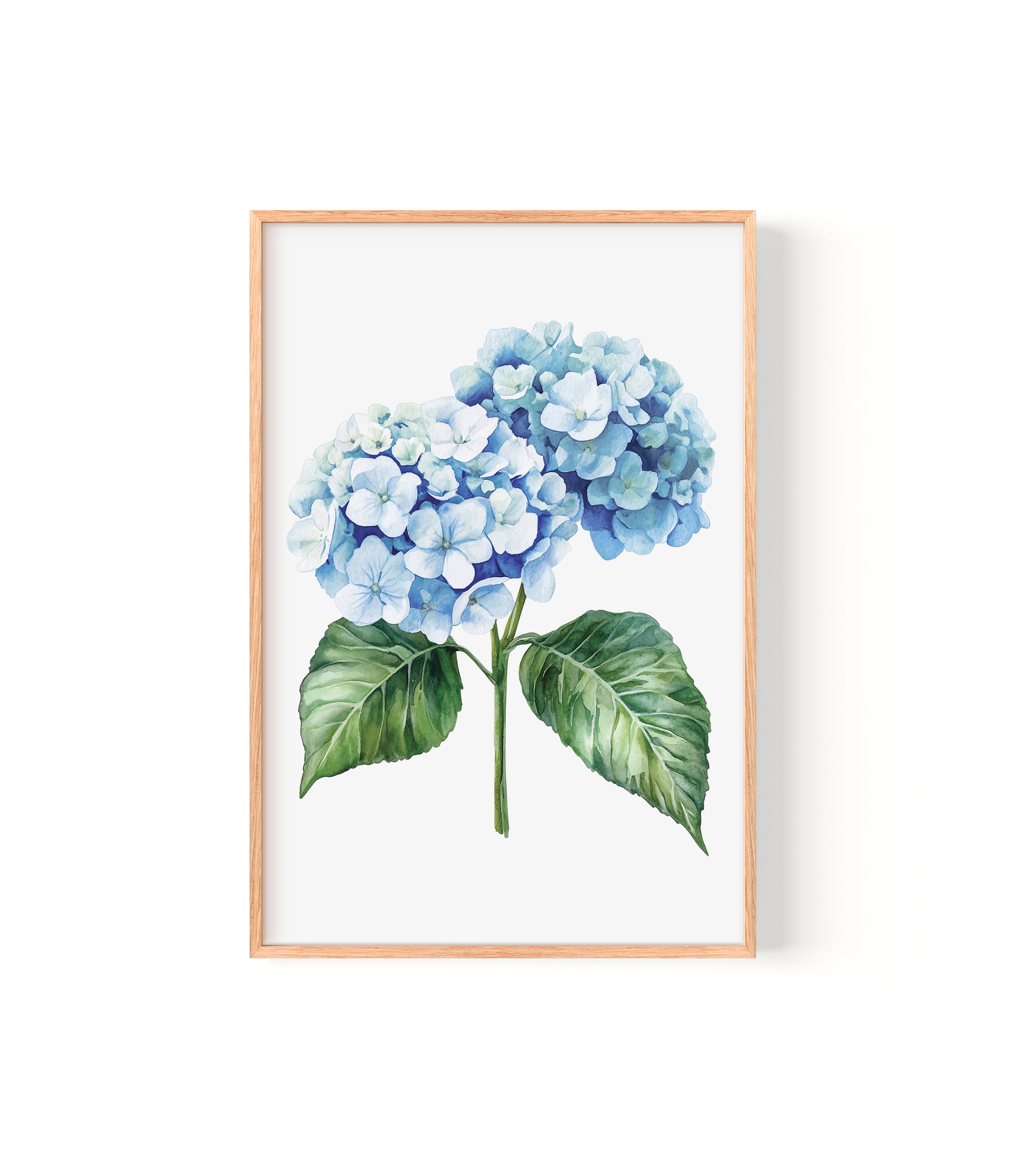 A framed watercolor painting depicting a cluster of blue hydrangea flowers with green leaves.