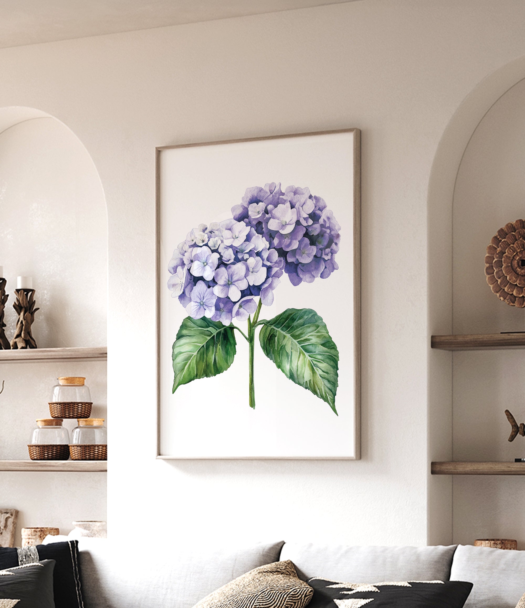 a framed painting of a purple hydrangea flower hanging on a wall in a living room.