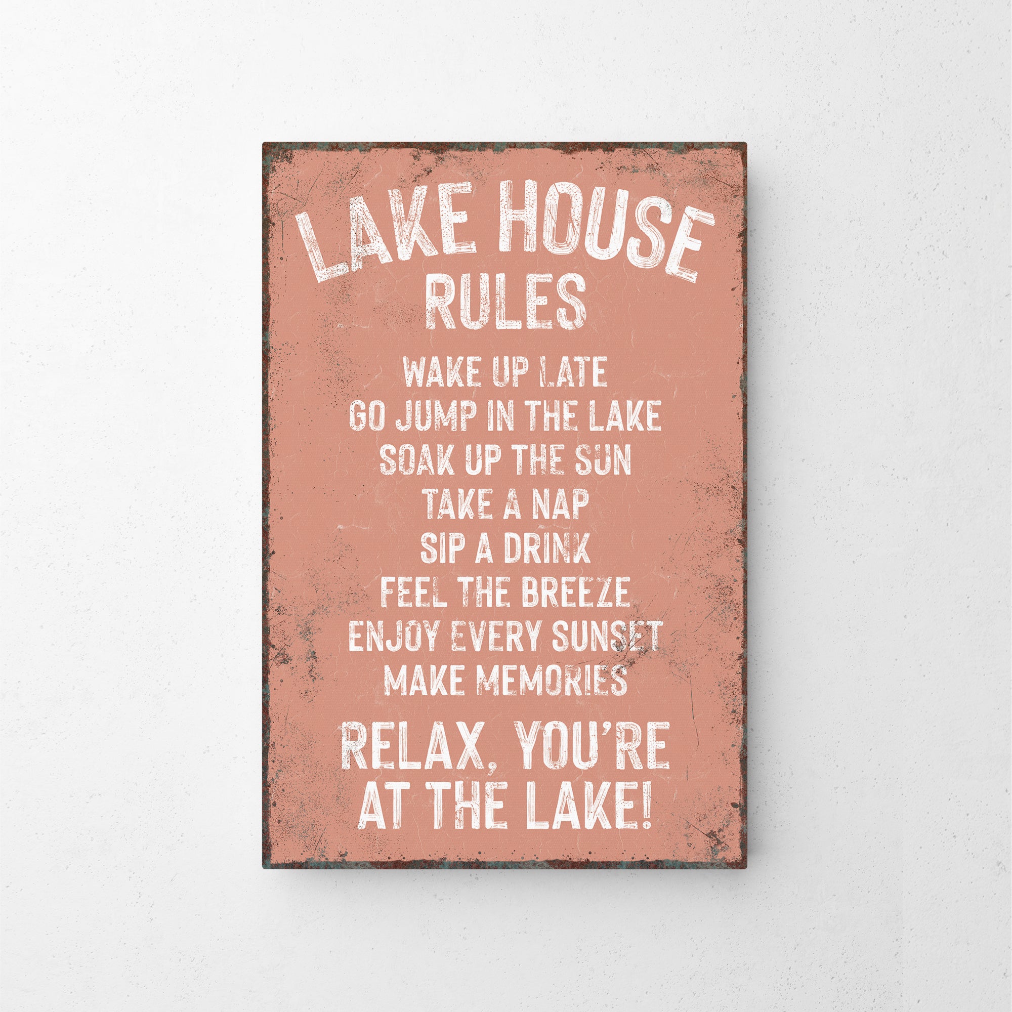 a sign on a wall that says lake house rules