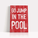 a red sign that says go jump in the pool