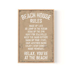 a sign that says beach house rules