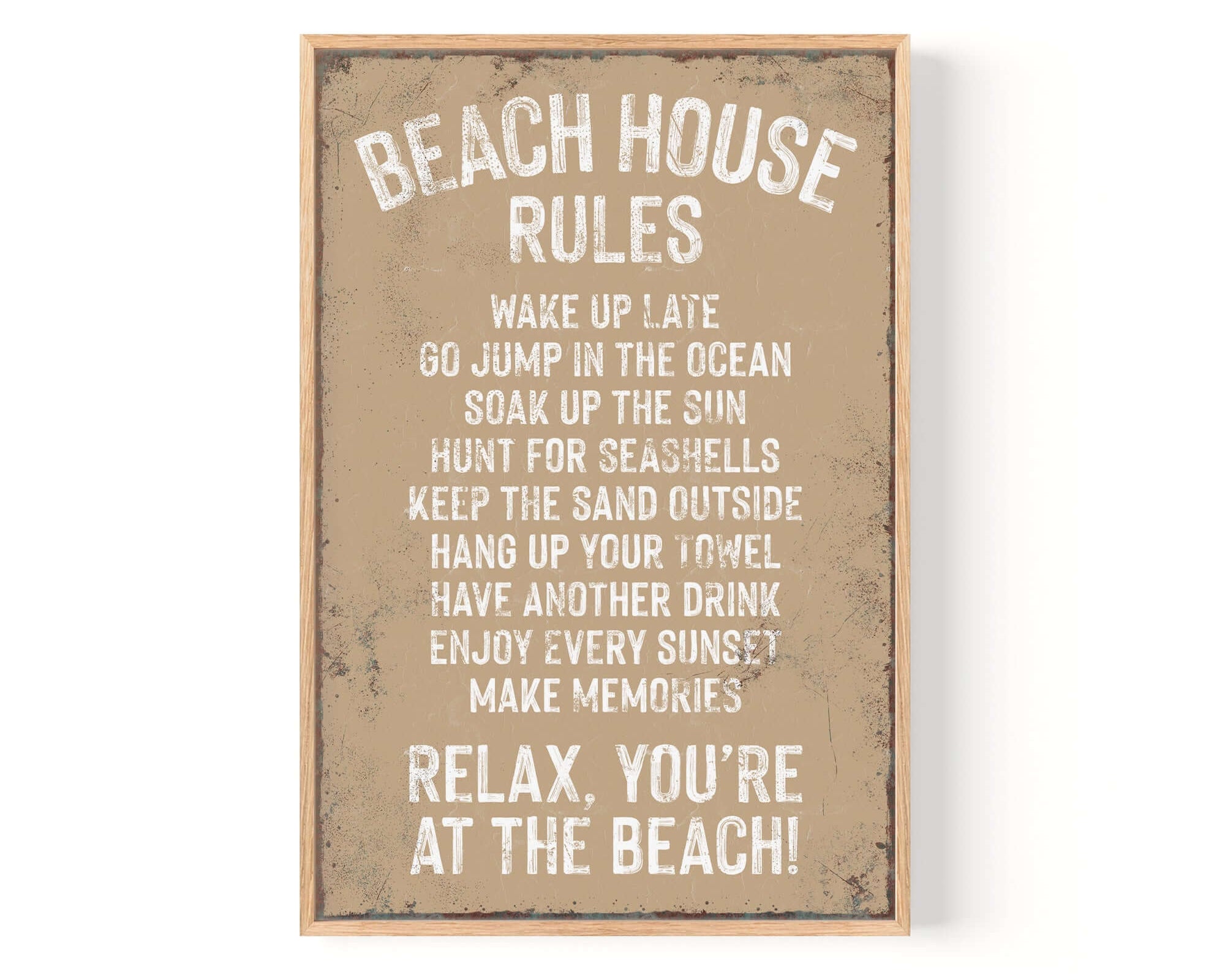 Add charm to your home with the Beach House Rules Sign in Latte, featuring fun beach reminders in white text on a tan background and rusted edge for a vintage look—perfect wall decor for any space.