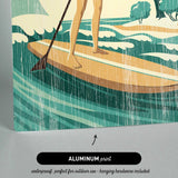 The image is an illustration of a woman paddleboarding on a body of water, with a text overlay that reads "ALUMINUM print" and "waterproof, perfect for outdoor use - hanging hardware included".