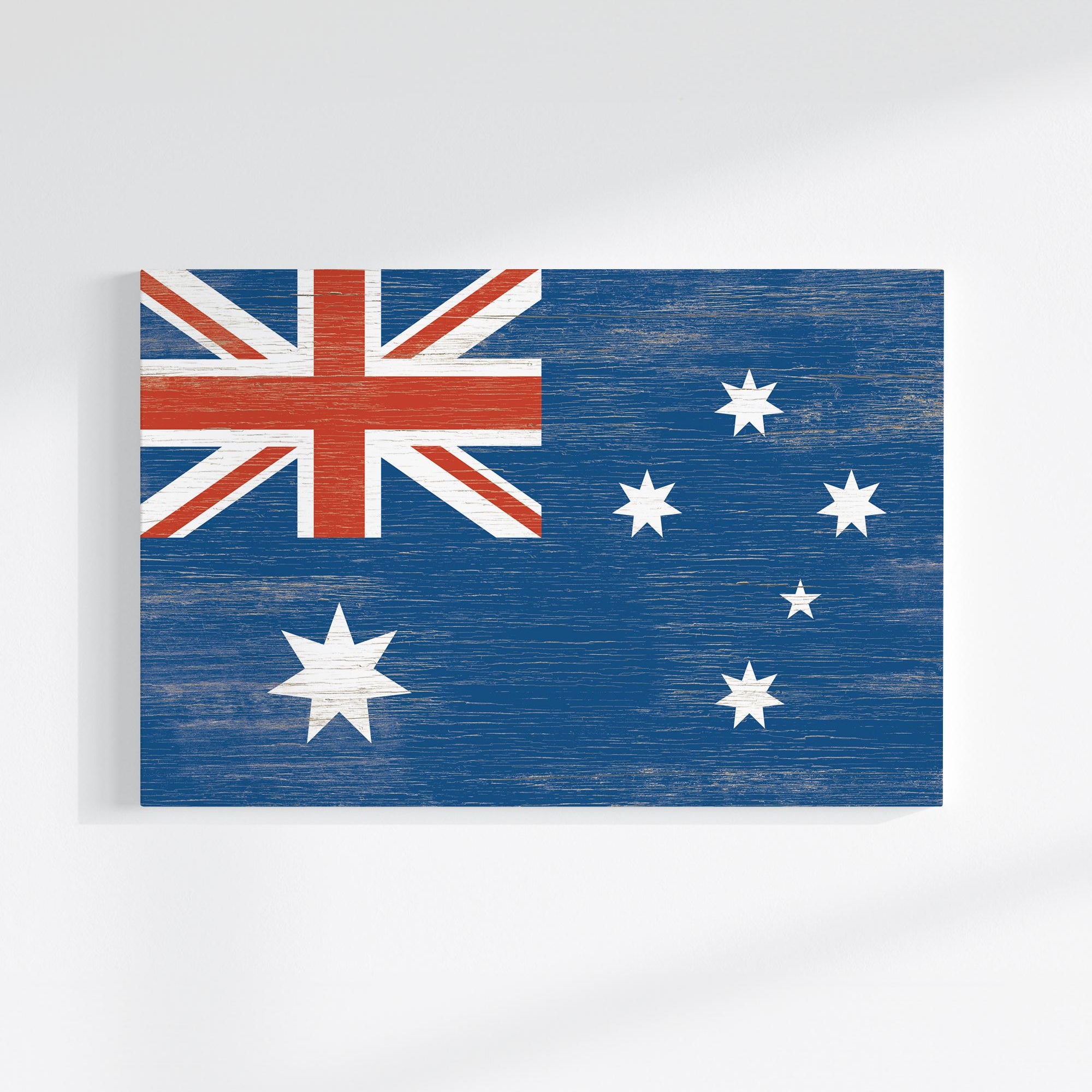 a wooden sign with a flag of australia painted on it