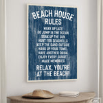 The Beach House Rules Sign, Painted Wood, Nautical, adds relaxed coastal decor above a table with a hat and books.