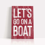 a wooden sign that says let&#39;s go on a boat
