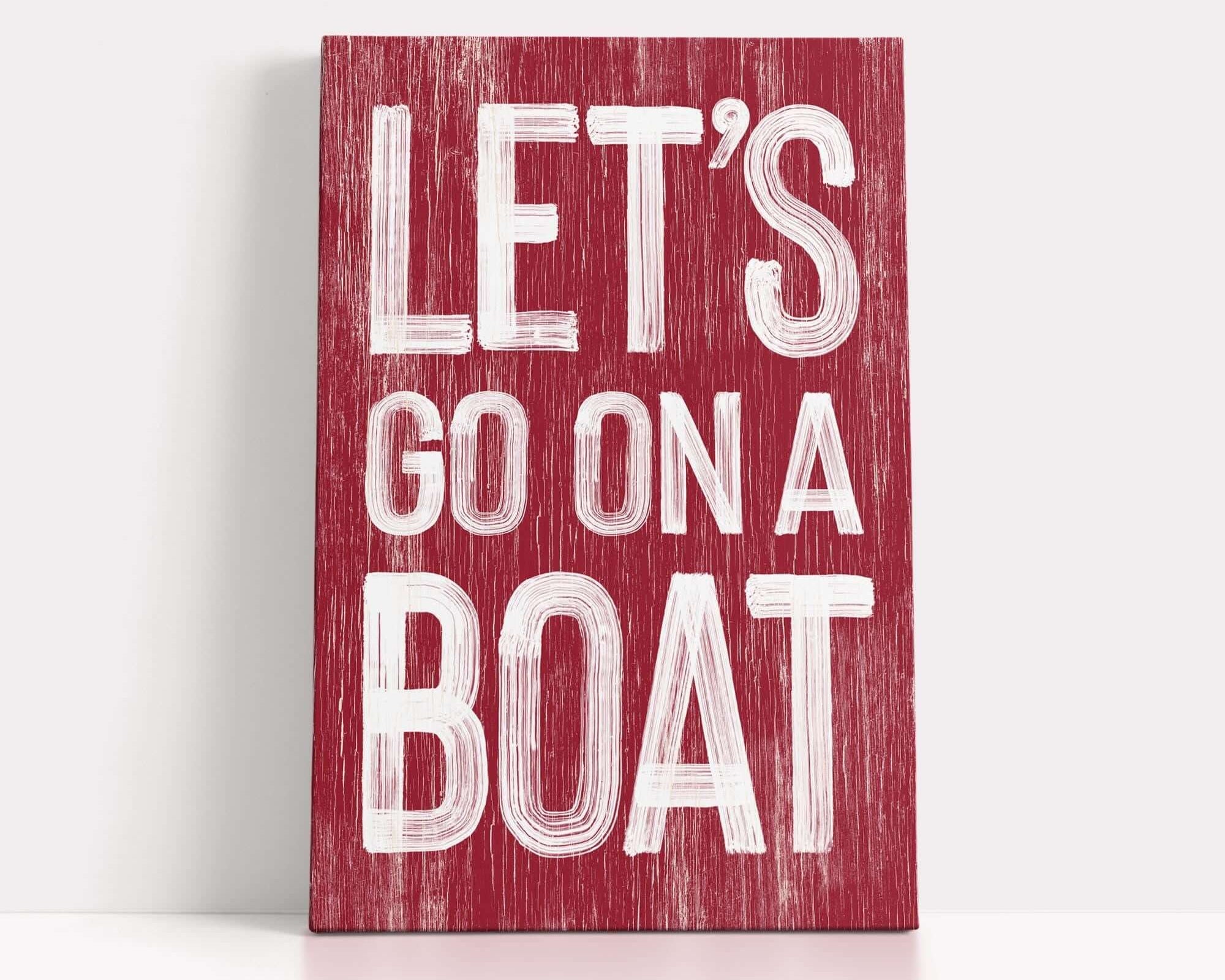 a wooden sign that says let's go on a boat