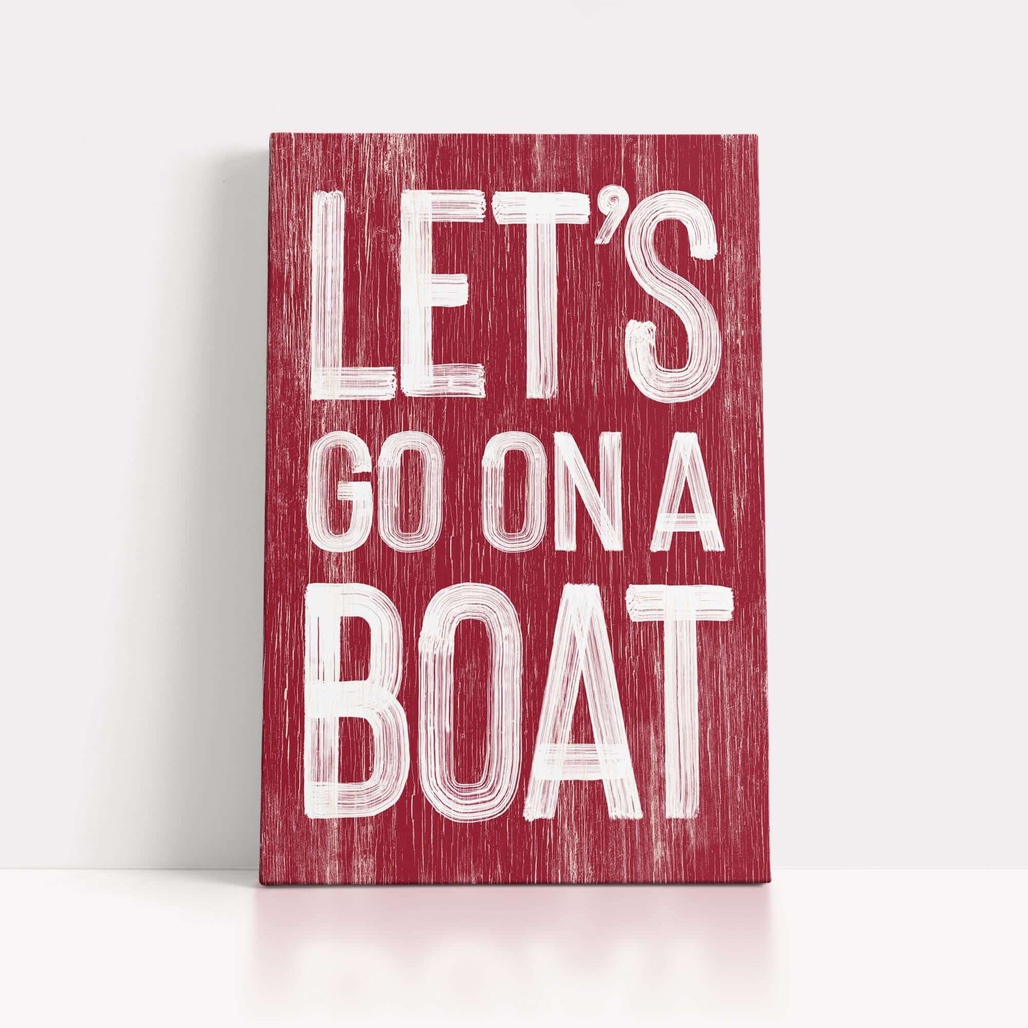 a wooden sign that says let's go on a boat