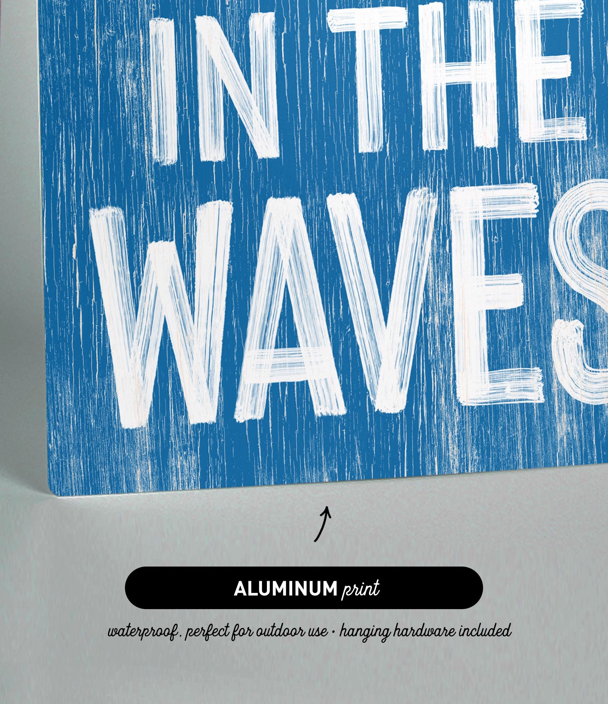 a blue sign that says in the waves
