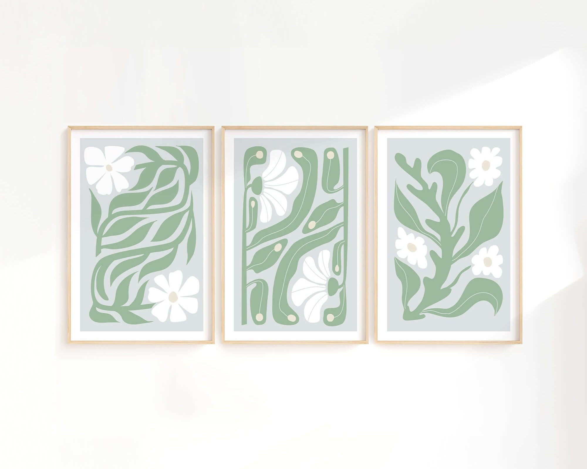 The Flower Blocks Triptych | Set of Three Prints | 016 features abstract botanical prints with green leaves and white flowers, perfect as elegant wall art for your home.