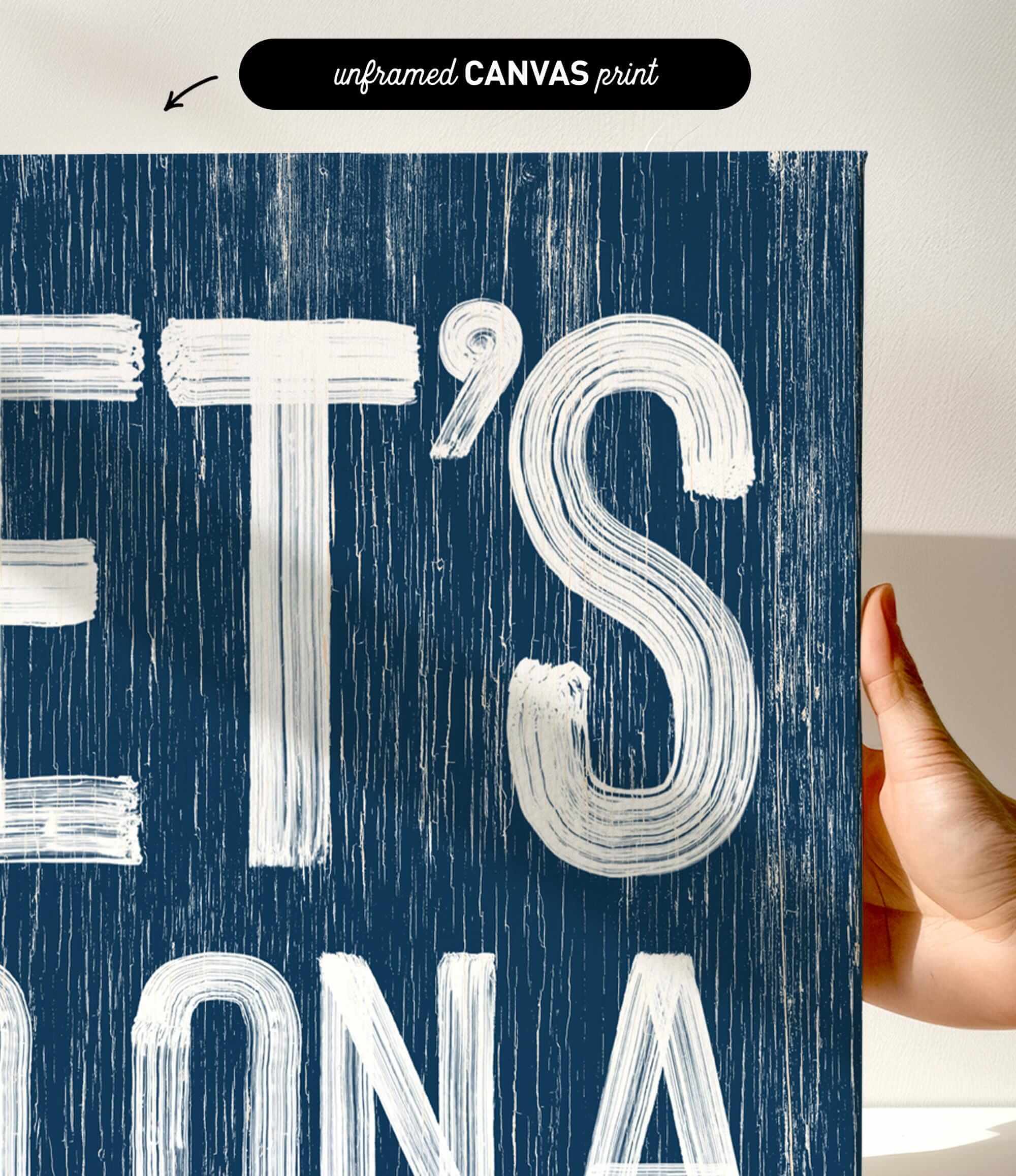 a person holding up a sign that says et&#39;s on a blue background