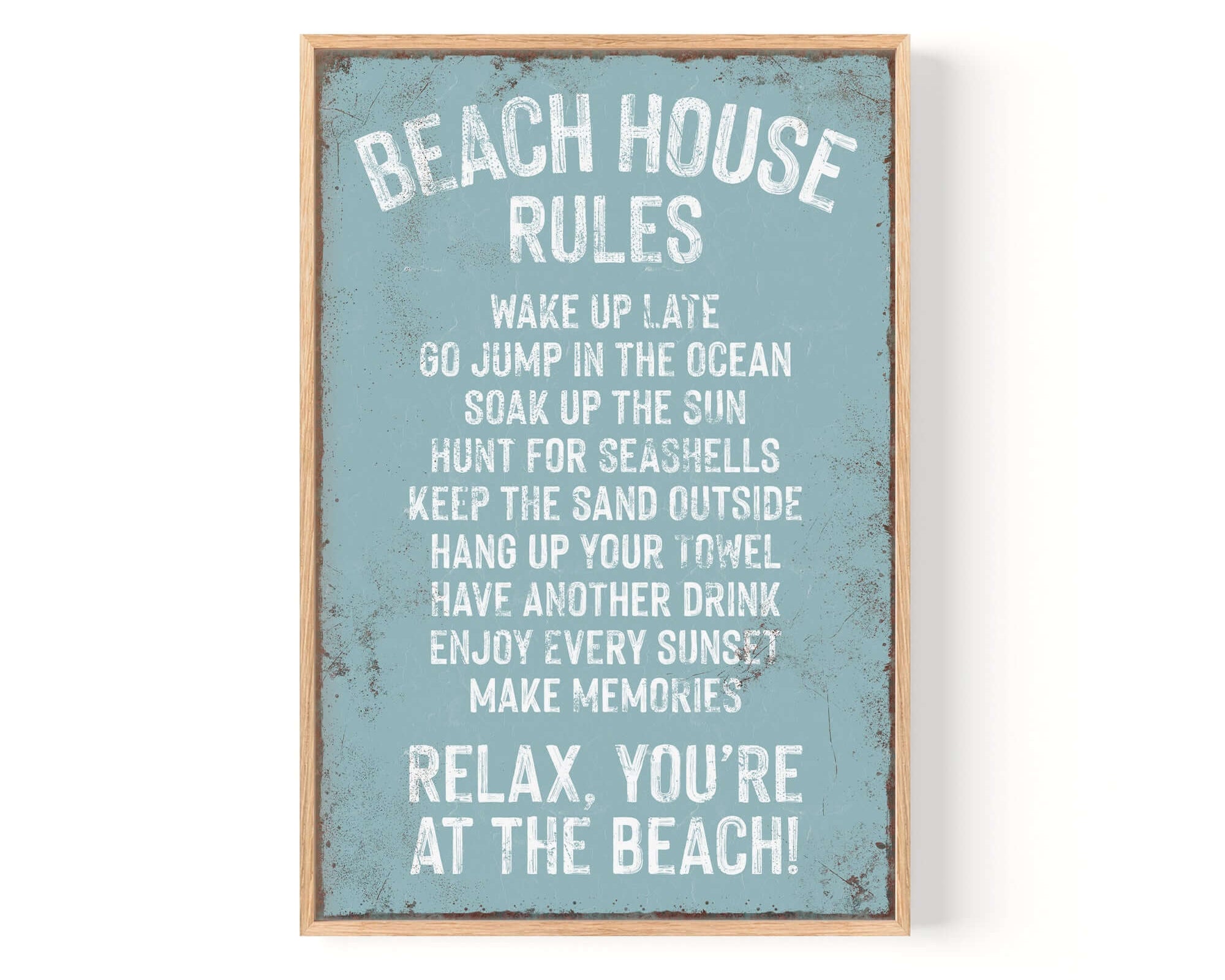 The Beach House Rules Sign, Tide edition, features rusted edges and beach-themed rules on a blue distressed background—a perfect coastal wall decor accent.
